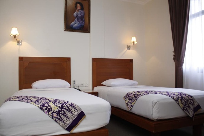 Imagen de la habitación del Hotel PIA Pangkalpinang. Foto 13