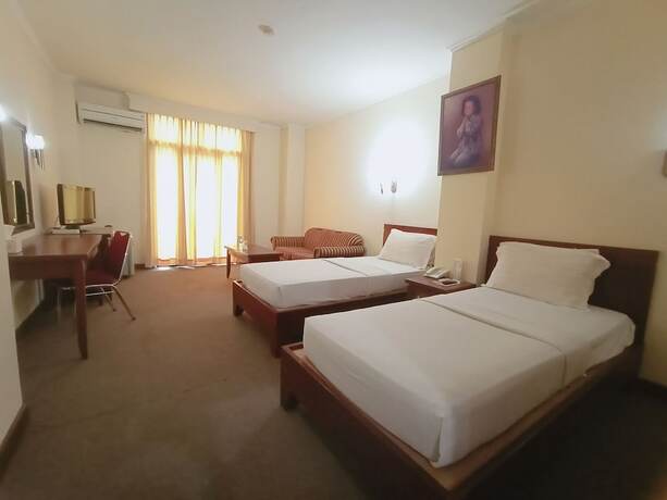 Imagen de la habitación del Hotel PIA Pangkalpinang. Foto 15