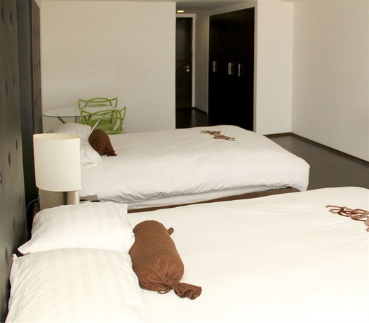 Imagen de la habitación del Hotel PIA SUITES. Foto 6