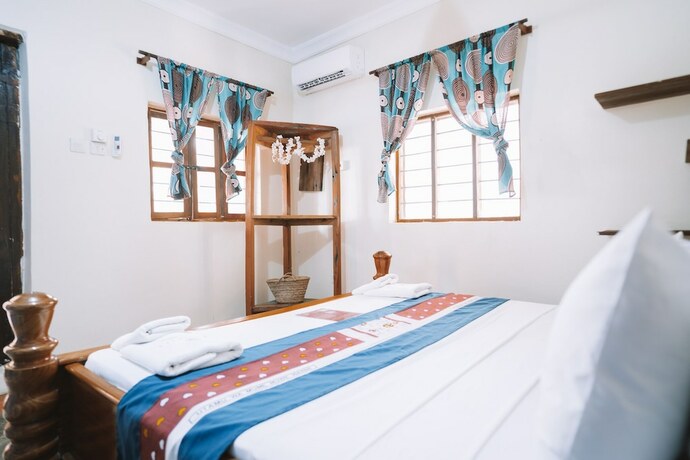 Imagen de la habitación del Hotel PILI PILI UHURU. Foto 14