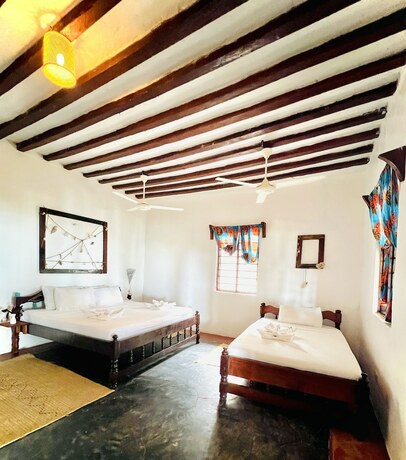 Imagen de la habitación del Hotel PILI PILI UHURU. Foto 17