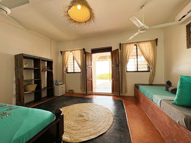 Imagen de la habitación del Hotel PILI PILI UHURU. Foto 18
