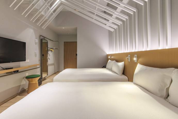 Imagen de la habitación del Hotel PIN, Jiaoxi. Foto 3