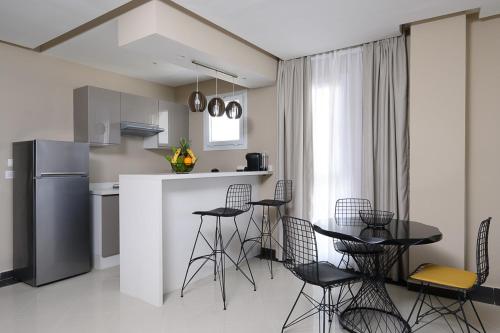 Imagen de la habitación del Hotel PLAYA DEL PACHA Suites. Foto 17