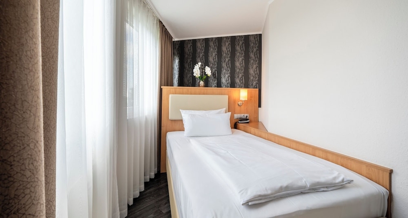 Imagen de la habitación del Hotel PLAZA INN Stuttgart-Filderstadt. Foto 7