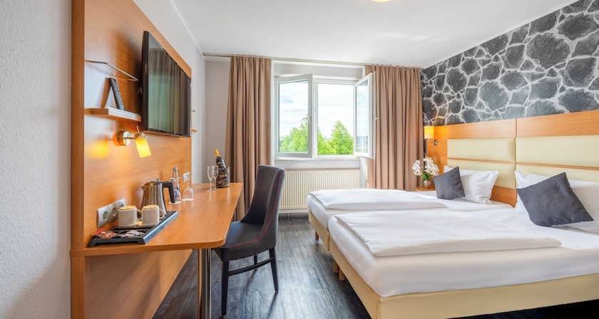 Imagen de la habitación del Hotel PLAZA INN Stuttgart-Filderstadt. Foto 13
