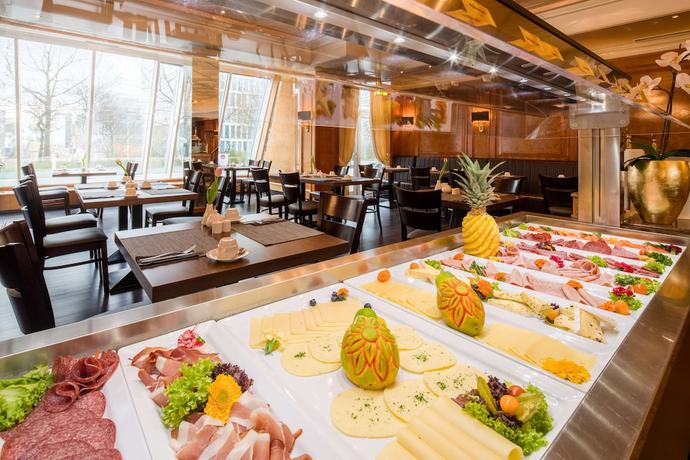 Imagen del bar/restaurante del Hotel PLAZA Premium Darmstadt. Foto 2