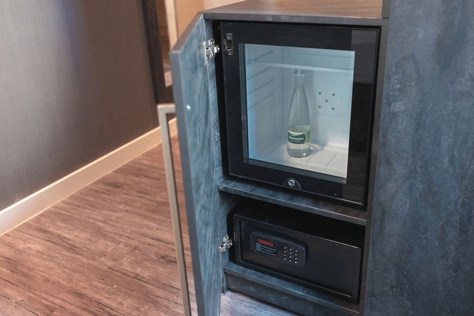 Imagen de la habitación del Hotel PLAZA Premium Heidelberg. Foto 9