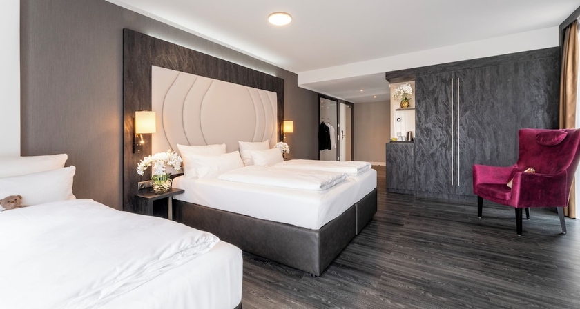 Imagen de la habitación del Hotel PLAZA Premium Heidelberg. Foto 10