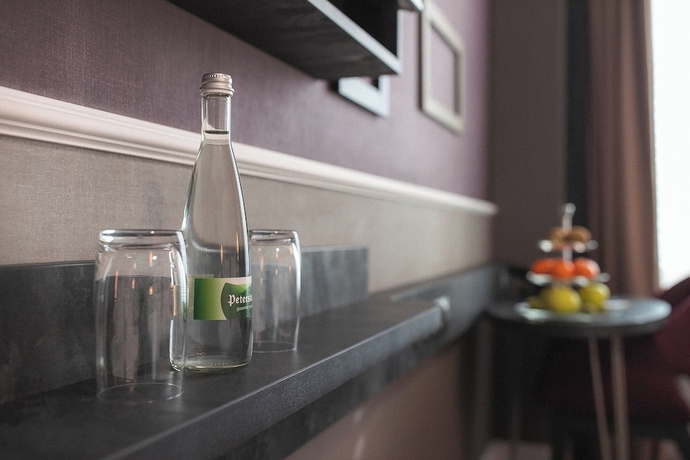 Imagen de la habitación del Hotel PLAZA Premium Heidelberg. Foto 14