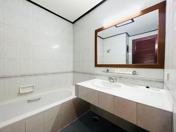 Imagen de la habitación del Hotel PN Mansion. Foto 16