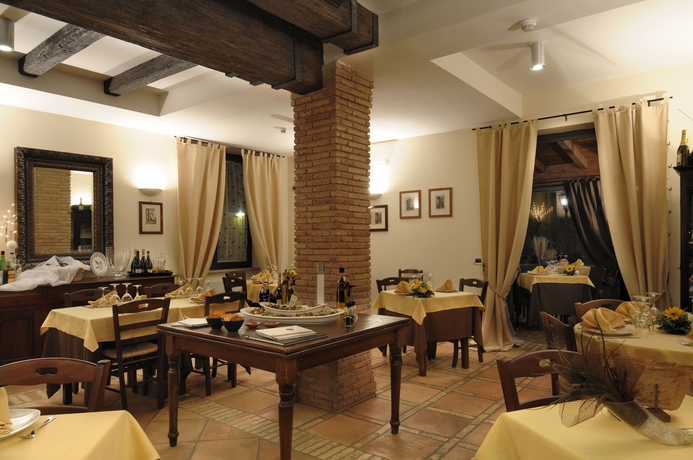 Imagen del bar/restaurante del Hotel POGGIO REGILLO. Foto 6