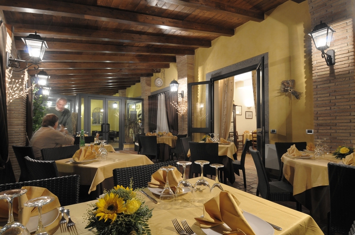 Imagen del bar/restaurante del Hotel POGGIO REGILLO. Foto 7