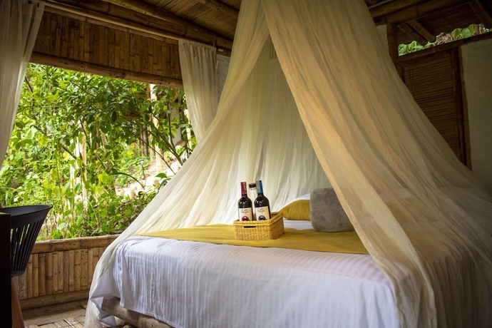 Imagen de la habitación del Hotel POINCOS ECO HOTEL. Foto 10