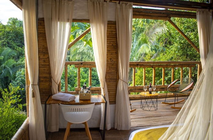 Imagen de la habitación del Hotel POINCOS ECO HOTEL. Foto 12