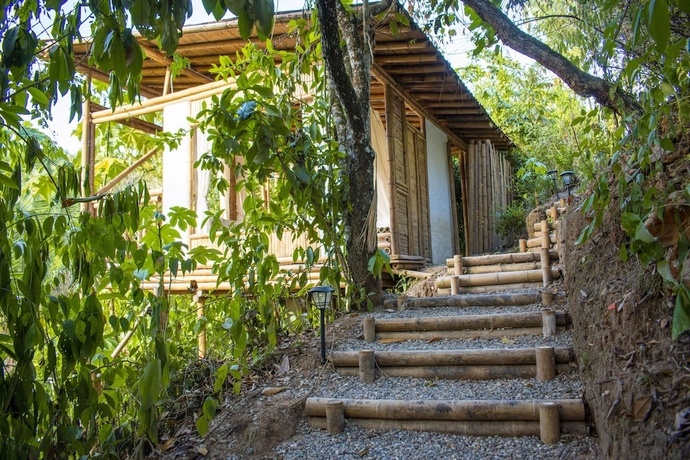 Imagen de la habitación del Hotel POINCOS ECO HOTEL. Foto 13