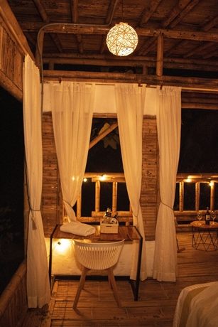 Imagen de la habitación del Hotel POINCOS ECO HOTEL. Foto 14