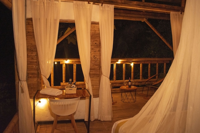 Imagen de la habitación del Hotel POINCOS ECO HOTEL. Foto 16