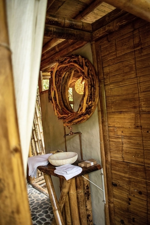 Imagen de la habitación del Hotel POINCOS ECO HOTEL. Foto 17