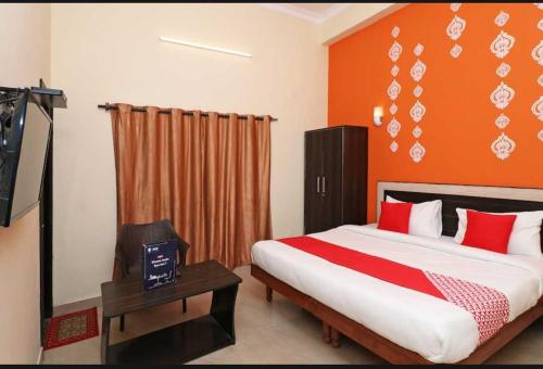 Imagen de la habitación del Hotel POP Radhe Oyo. Foto 20