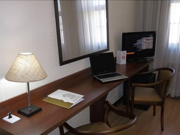 Imagen de la habitación del Hotel PORTO ALEGRE CITY. Foto 11