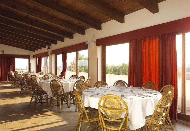 Imagen del bar/restaurante del Hotel PORTO KALEO RESORT. Foto 5