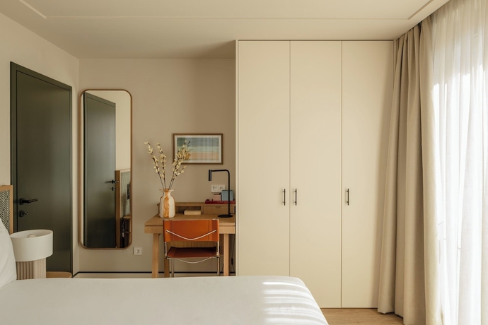Imagen de la habitación del Hotel POSTCODE Atocha. Foto 4
