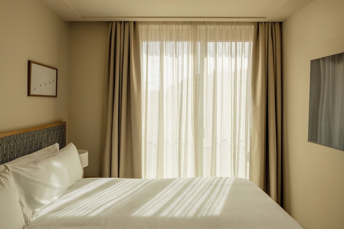 Imagen de la habitación del Hotel POSTCODE Atocha. Foto 5