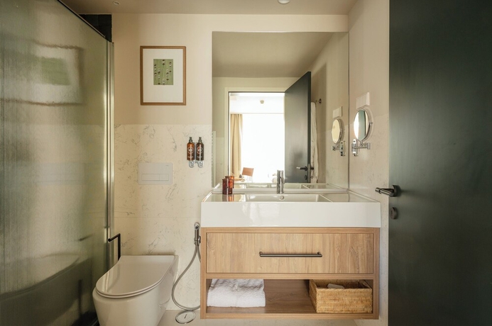 Imagen de la habitación del Hotel POSTCODE Atocha. Foto 8