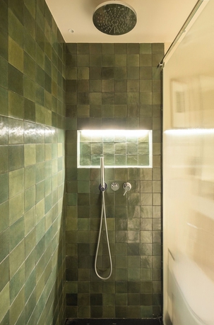 Imagen de la habitación del Hotel POSTCODE Atocha. Foto 9