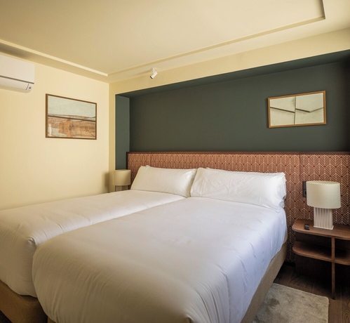 Imagen de la habitación del Hotel POSTCODE Chueca. Foto 10