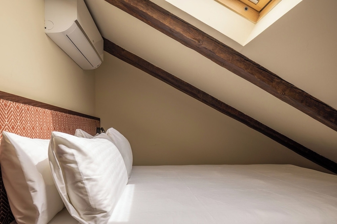 Imagen de la habitación del Hotel POSTCODE Chueca. Foto 13