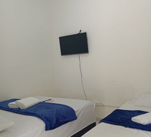 Imagen de la habitación del Hotel POUSADA CANTINHO DO GUARUJ&Aacute;. Foto 8