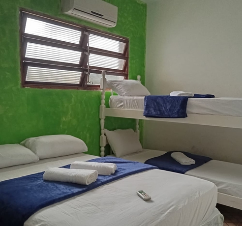 Imagen de la habitación del Hotel POUSADA CANTINHO DO GUARUJ&Aacute;. Foto 9