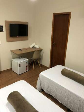 Imagen de la habitación del Hotel POUSADA HD. Foto 15