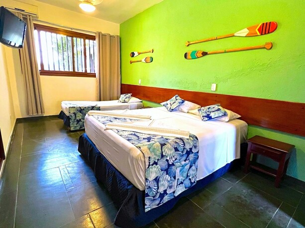 Imagen de la habitación del Hotel POUSADA NAAN LAZARO UBATUBA. Foto 15