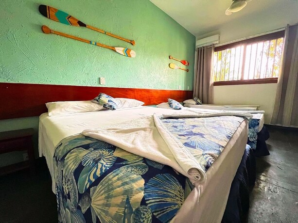 Imagen de la habitación del Hotel POUSADA NAAN LAZARO UBATUBA. Foto 17