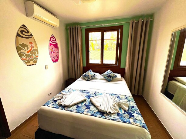 Imagen de la habitación del Hotel POUSADA NAAN LAZARO UBATUBA. Foto 19