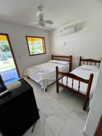 Imagen de la habitación del Hotel POUSADA SOL DE VERAO - Cumuruxatiba. Foto 10