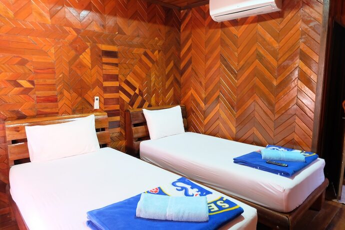 Imagen de la habitación del Hotel PP Sand Sea View Resort. Foto 18