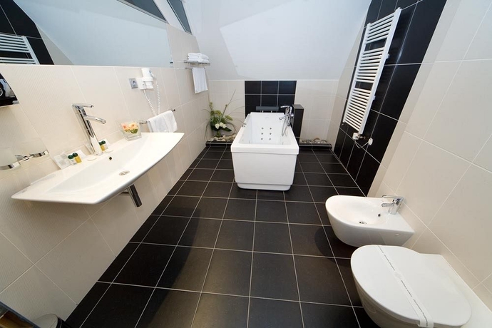 Imagen de la habitación del Hotel PRAGUE INN. Foto 9