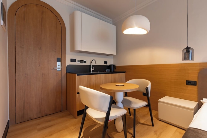 Imagen de la habitación del Hotel PRI ApartHotel. Foto 14