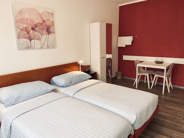Imagen de la habitación del Hotel PRIMADOM Aparthotel. Foto 8