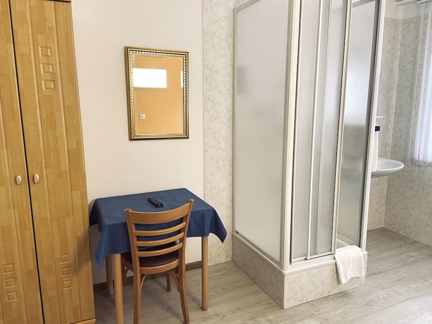 Imagen de la habitación del Hotel PRIMADOM Aparthotel. Foto 17