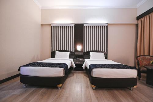 Imagen de la habitación del Hotel PRIME CITY HOTEL KLUANG. Foto 14