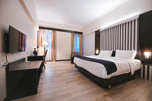 Imagen de la habitación del Hotel PRIME CITY HOTEL KLUANG. Foto 15