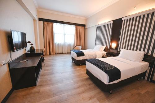 Imagen de la habitación del Hotel PRIME CITY HOTEL KLUANG. Foto 18