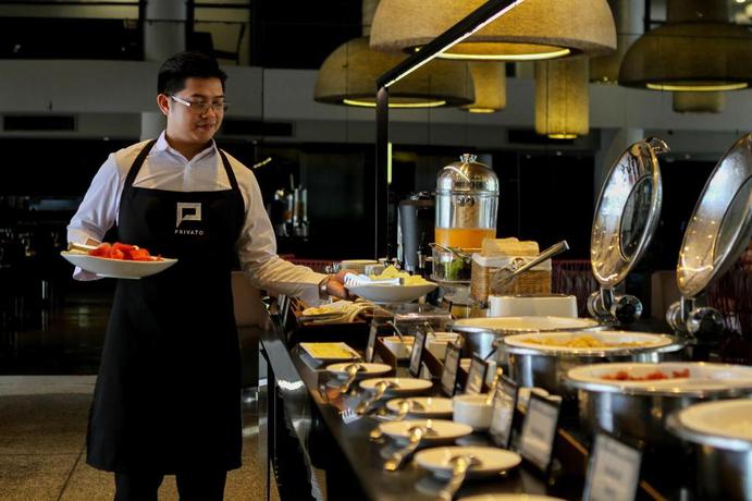 Imagen del bar/restaurante del Hotel PRIVATO QUEZON CITY. Foto 9