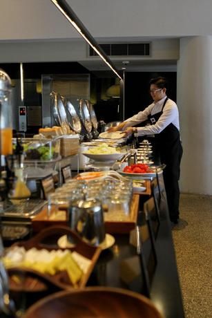 Imagen del bar/restaurante del Hotel PRIVATO QUEZON CITY. Foto 11