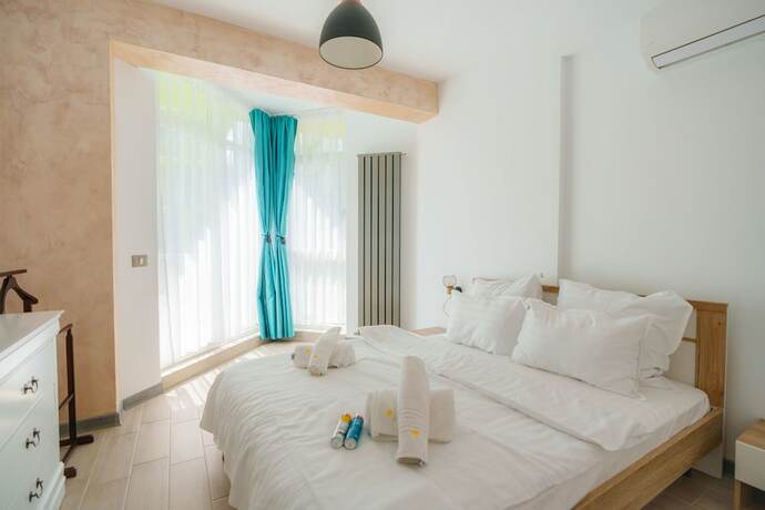 Imagen de la habitación del Hotel PROMENADA Alezzi Apartments. Foto 11